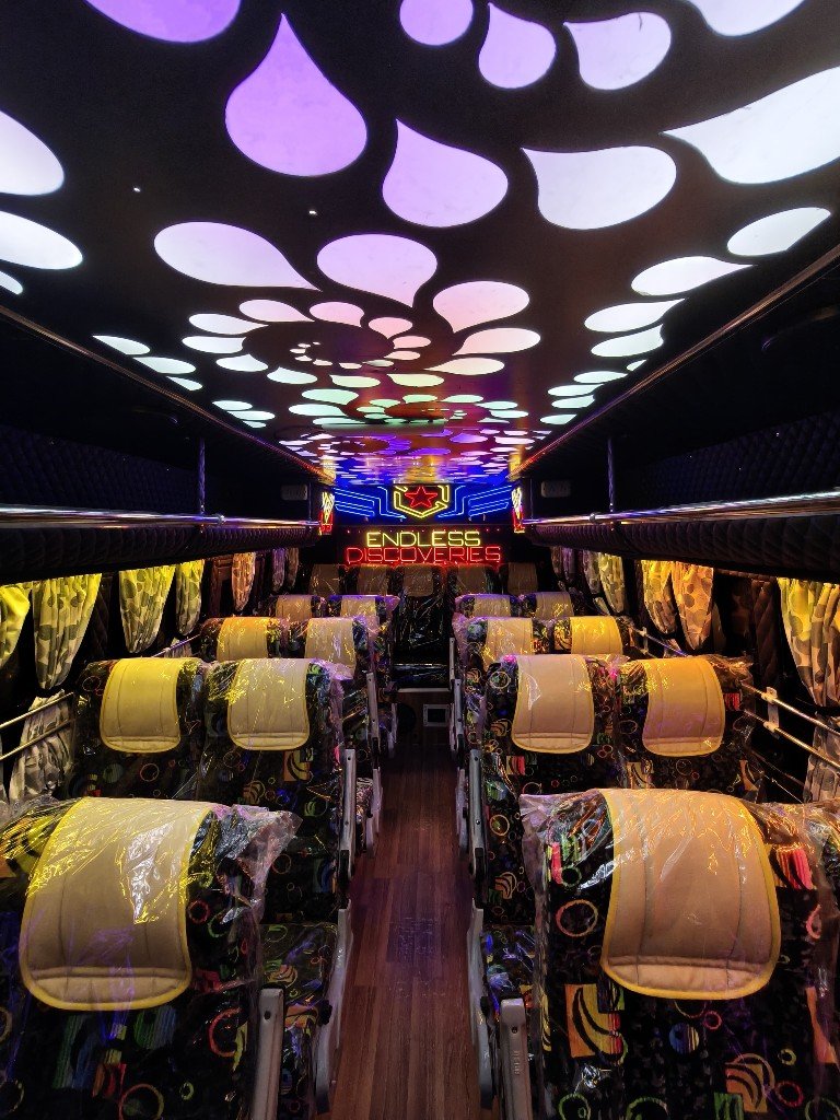 Coach interior with Endless Discoveries neon lighting